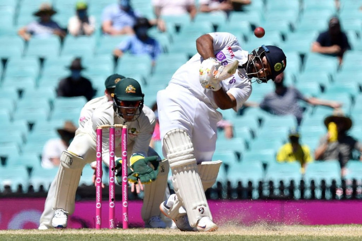 India's Rishabh Pant hits out as India reached lunch at 206-3 chasing 407 to win the third Test against Australia