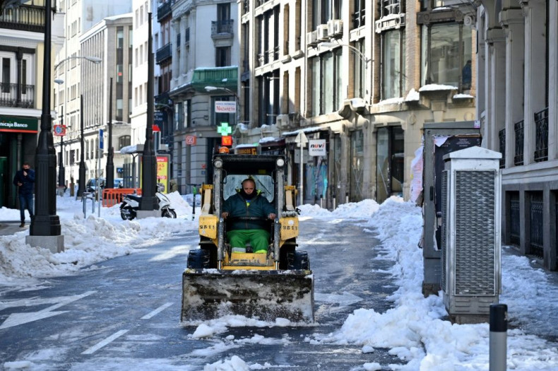 Work continued Monday to clear roads