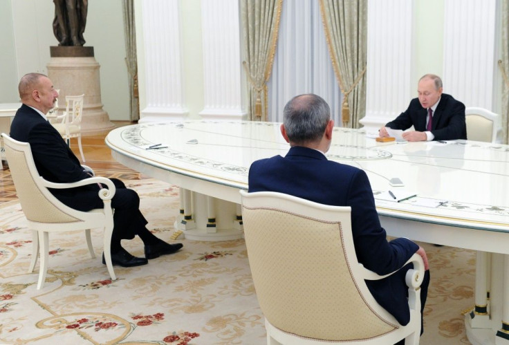 Russian President Vladimir Putin's meeting with Armenian Prime Minister Nikol Pashinyan (C) and Azerbaijani President Ilham Aliyev lasted four hours
