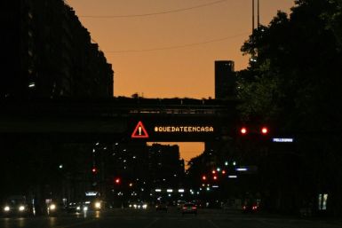 This 2020 photo shows an electric sign in Buenos Aires telling people to stay home, as the city grapples with the coronavirus