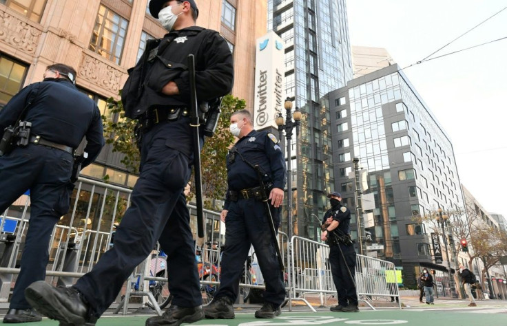 Police deployed dozens of officers and constructed security barriers outside Twitter's San Francisco headquarters, but only a few protesters and counter-protesters arrived