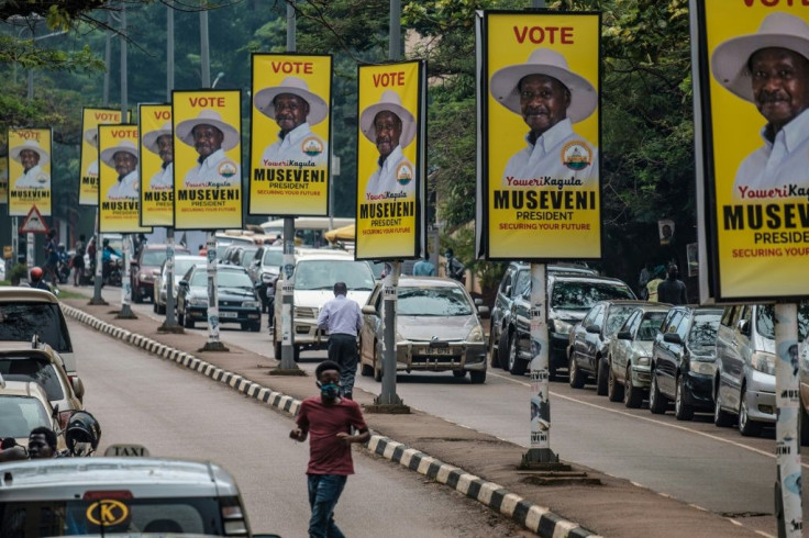 Bright yellow posters for incumbent Yoweri Museveni are everywhere in Uganda's capital Kampala
