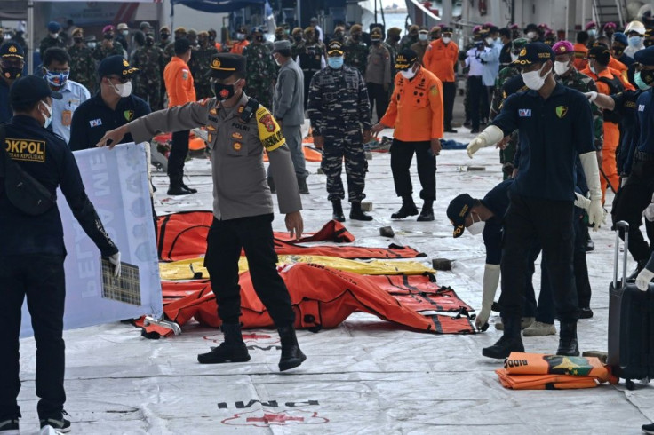 Every day scores of bags containing body parts recovered from the scene of the crash arrive for testing