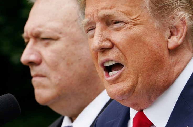 Secretary of State Mike Pompeo (L) says he has cancelled a foreign trip as President Donald Trump (R) faces an impeachment vote in the Democrat-controlled House of Representatives