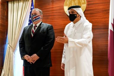 US Secretary of State Mike Pompeo, on what is likely his last official trip, meets with Qatar's Foreign Minister Mohammed bin Abdulrahman Al-Thani in November 2020