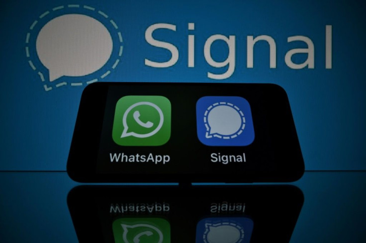 WhatsApp (green logo, left) reassured users about privacy as it faces rival secure mobile messaging services such as Signal