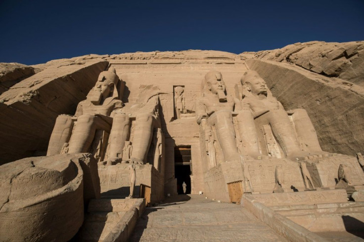 The colossal statues of a seated Ramses II at the entrance of Abu Simbel archaeological site, rescued from the waters of the reservoir behind the Aswan Dam