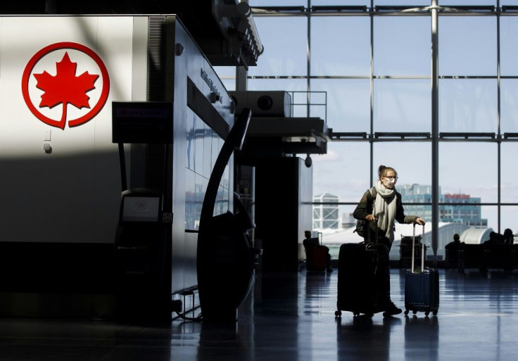 An Air Canada logo at Toronto Pearson International Airport -- the airline is cutting staff due to Covid-19