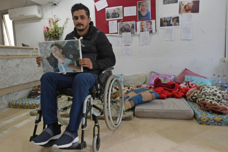 Rached El Arbi, 30, was shot during the unrest in January 2011. Amnesty International says "victims are still struggling to obtain justice and reparations for grave human rights violations committed during the revolution"
