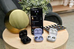 The Samsung Galaxy S21 handset and Samsung Galaxy Buds Pro are displayed at a product unveiling by the South Korean electronics giant