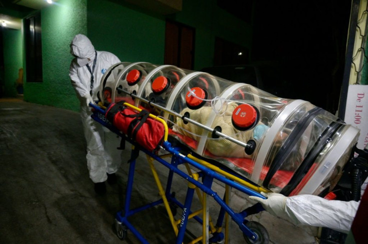 A paramedic transfers a Covid-19 patient to an emergency room in Naucalpan, Mexico on January 7, 2021