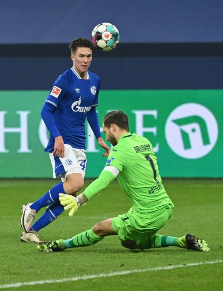 Schalke striker Matthew Hoppe (L) scoring the first of his three goals against Hoffenheim