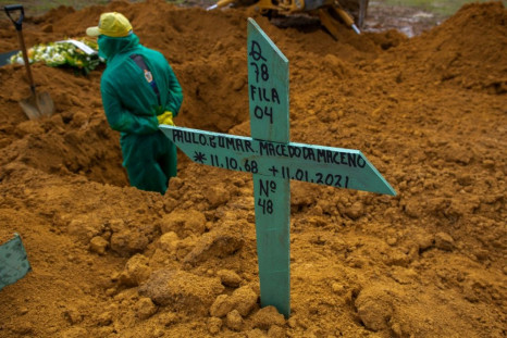 The grave of a Covid-19 victim in Manaus is seen as Brazil records more than 205,000 deaths from Covid-19, second only to the United States