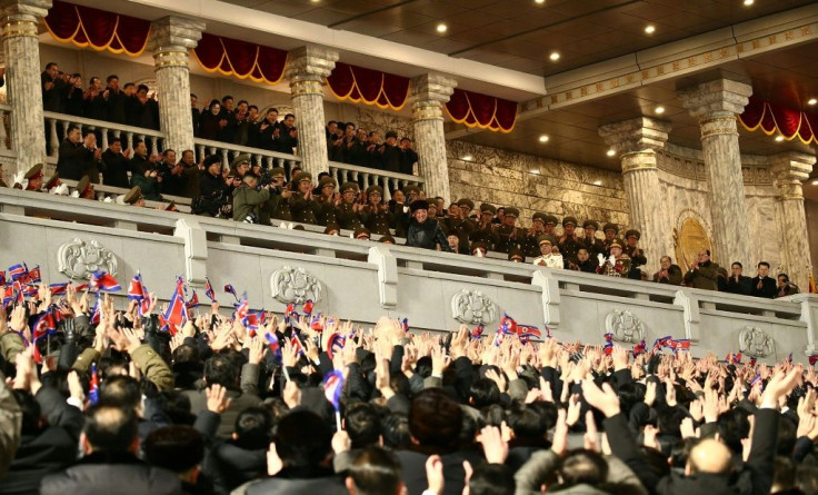 North Korean leader Kim Jong Un is cheered during a military parade celebrating the 8th Congress of the Workers' Party of Korea (WPK) in Pyongyang