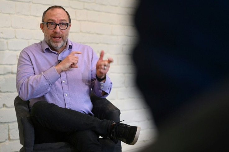 Wikipedia founder Jimmy Wales ackowledges he was afraid someone would beat him to creating a free online collaborative encyclopedia