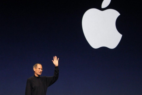 Apple Inc. CEO Steve Jobs gives a wave at the conclusion of the launch of the iPad 2 on stage during an Apple event in San Francisco, California March 2, 2011.