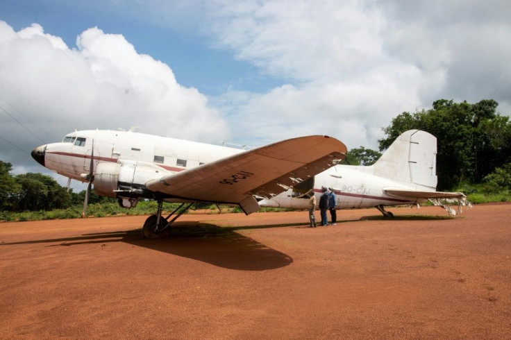 An old twin-engine DC2 plane at the Shilatembo site, symbolising Lumumba's last flight