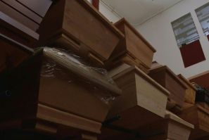 As Germany's Meissen crematorium struggles to cope with an explosion in deaths from the coronavirus pandemic in the region, coffins are stacked up to three high or even stored in hallways awaiting cremation. Largely spared in the first wave of the outbrea