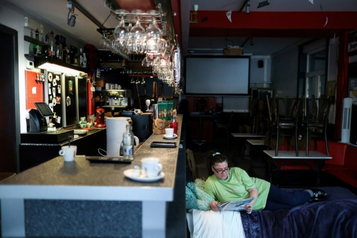 Carion is sleeping on an army cot set up next to the bar in her cafe, which she took over 12 years ago