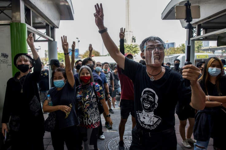 Earlier, another group protested at Bangkok's Victory Monument against Thailand's royal defamation law