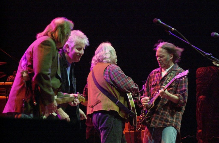 Stephen Stills (L), Graham Nash (2nd L), David Crosby (2nd R) and Neil Young (R) perform live in 2000