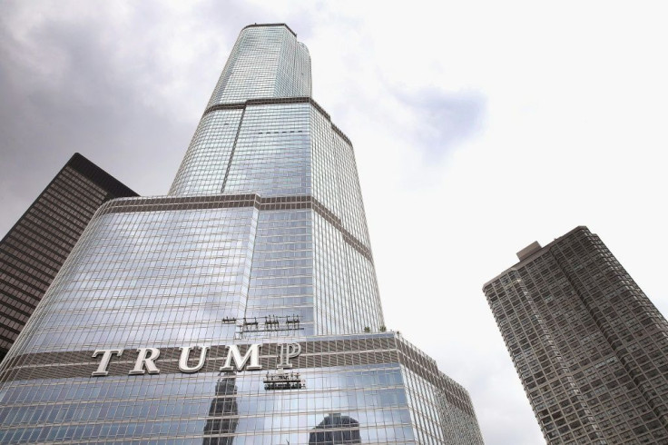 Trump Tower in Chicago is emblazoned with President Donald Trump's name, but many companies are cutting ties with the leader in an 11th-hour stampede