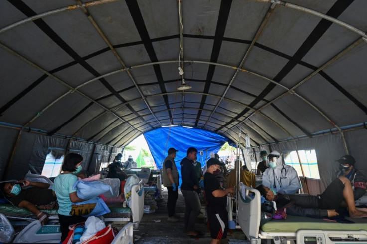 A makeshift ward was set up outside a regional hospital due to concerns of aftershocks in Mamuju