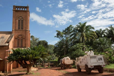 Armed groups waging a nationwide offensive captured Bangassou on January 3. A UN patrol is seen passing the city's cathedral in 2017.