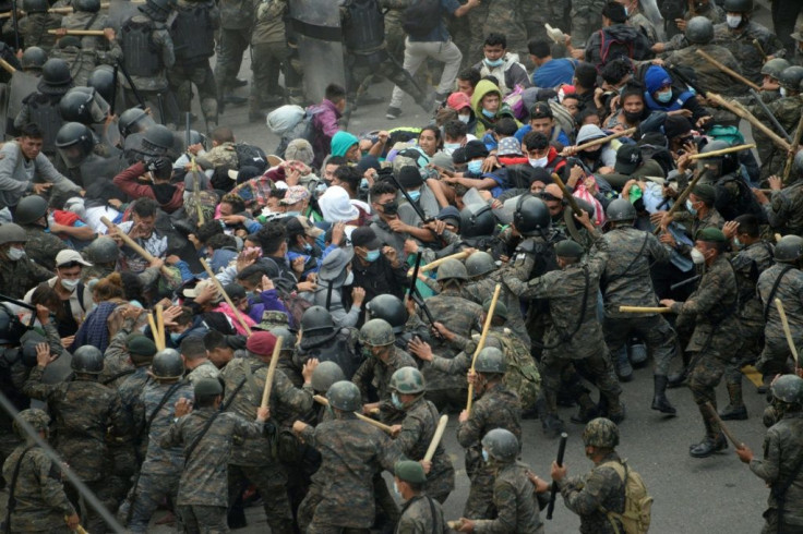 A health official said several of the Honduran migrants were injured after being struck in a confrontation with police in Guatemala