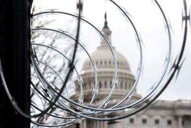 Barbed wire surround the US Capitol ahead of next week's presidential inauguration of Joe Biden