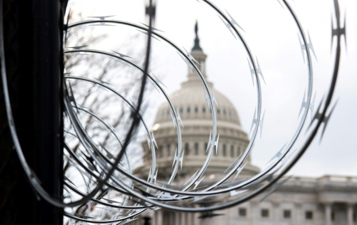 Barbed wire surround the US Capitol ahead of next week's presidential inauguration of Joe Biden