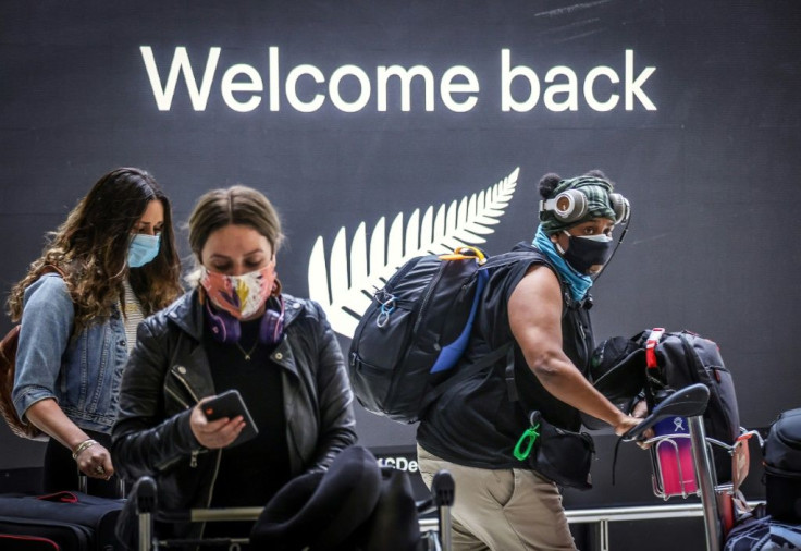 Passengers arrive at Sydney airport. Australia's border has been largely closed to overseas visitors since March 2020