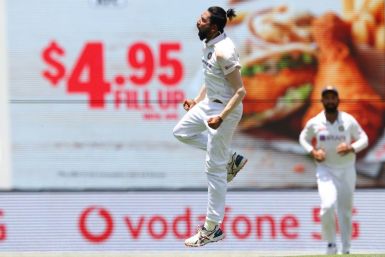 India fast bowler Mohammed Siraj celebrates the wicket of Australia's Marnus Labuschagne on day four of the fourth Test at the Gabba in Brisbane. He went on to take 5-73