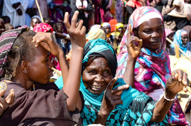 Millions of Sudanese have been displaced by years of conflict in Darfur; here women forced from their homes by fighting photographed in December 2020 protest the end of an international peacekeeping force