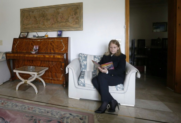 "I'm counting the days until I get my next visa," Idriss told AFP, sitting in her comfortable Damascus living room, surrounded by pictures of her far-flung children and late husband