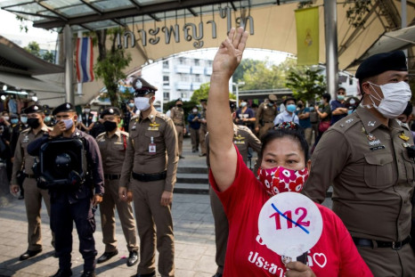 A woman protesting against section 112 of Thailand's penal code, which deals with lese majeste at Victory Monument in Bangkok on January 16