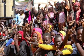 A December 31 file picture shows Sudanese internally displaced people in South Darfur protesting against the end of the United Nations and African Union peacekeeping mission