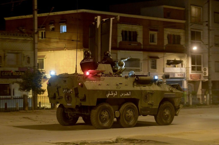 Security forces have deployed to stem the protests; here members of the National Guard patrol Ettadhamen on January 17