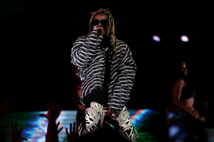 Rapper Lil Wayne was pardoned for exhibiting "generosity through commitment to a variety of charities, including donations to research hospitals and a host of foodbanks"
