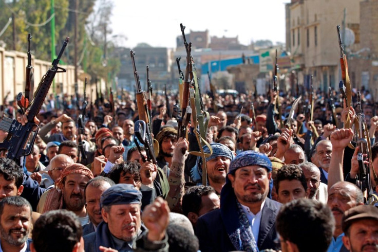 Supporters of Yemen's Huthi movement chant slogans during a demonstration against the outgoing US administration's decision to designate the Iran-backed rebels as terrorists, in the capital Sanaa
