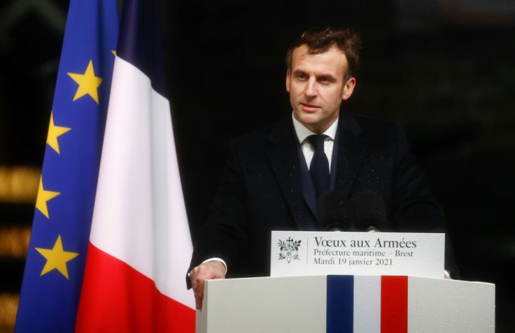 President Emmanuel Macron, seen here delivering  his New Year wishes to the military on Tuesday, is the first French head of state born after Algeria gained its independence