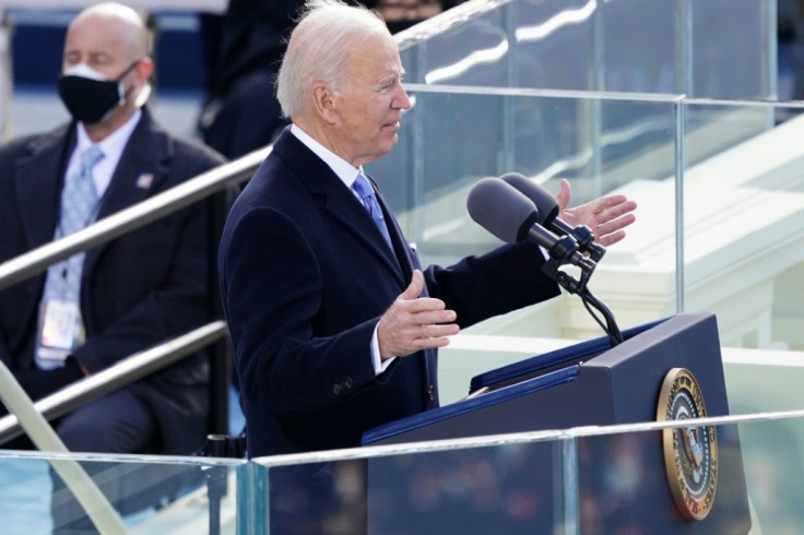 Joe Biden speaks at his inauguration as president, saying 'America has been tested anew, and America has risen to the challenge.'