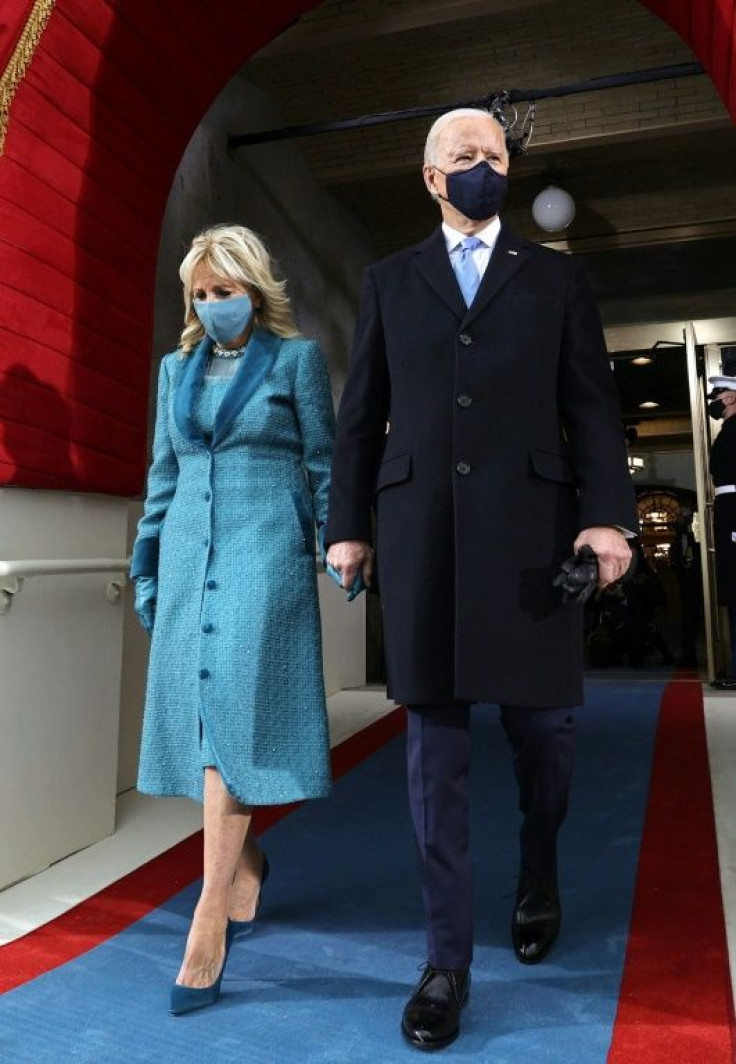 US President-elect Joe Biden (R) and incoming US First Lady Jill Biden arrive for his inauguration as the 46th US President, on the West Front of the US Capitol in Washington, DC on January 20, 2021