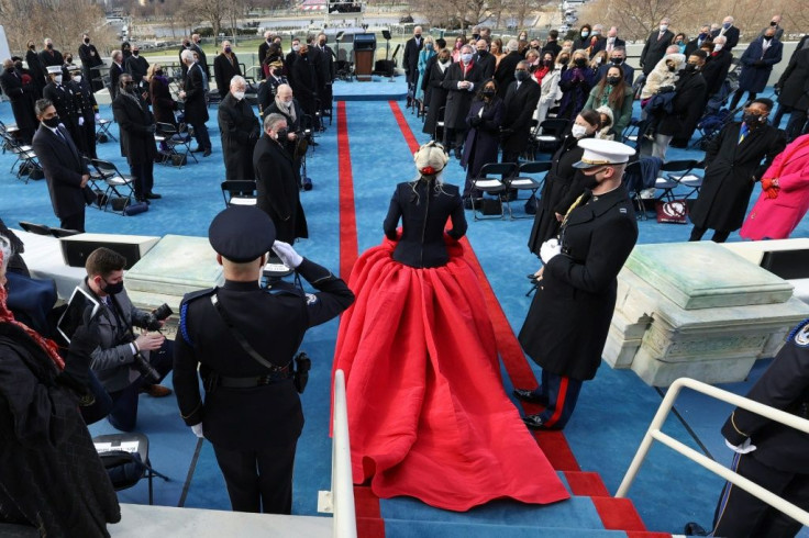 US singer Lady Gaga (C) arrives to perform "The Star-Spangled Banner" during the 59th Presidential Inauguration on January 20, 2021, at the US Capitol in Washington, DC