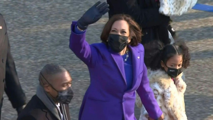 IMAGES US Vice President Kamala Harris and her husband, US Second Gentleman Doug Emhoff, alongside family members, walk along this year's non-traditional inaugural parade route, heading toward the White House, in Washington, DC.