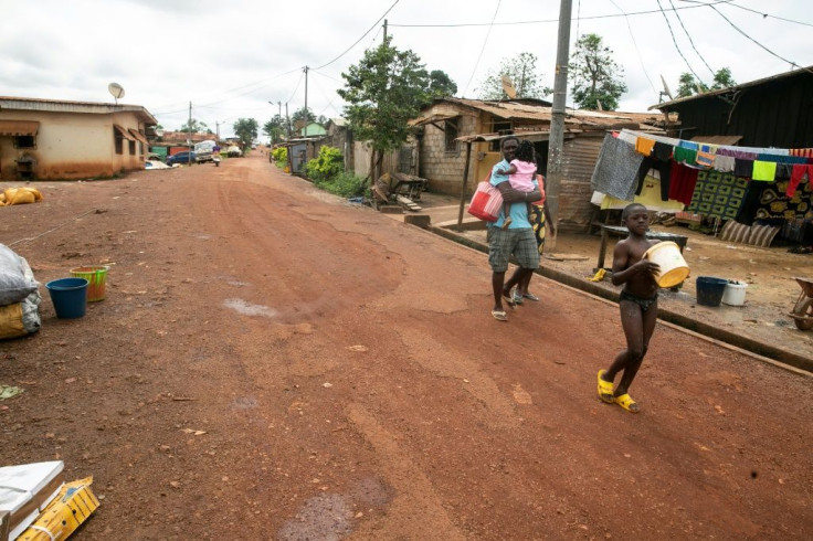 Many residents on the outskirts of Moanda have no running water or mains electricity