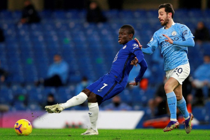 France midfielder N'Golo Kante (L) would have been unlikely to receive a work permit when he joined Leicester under the new points-based system