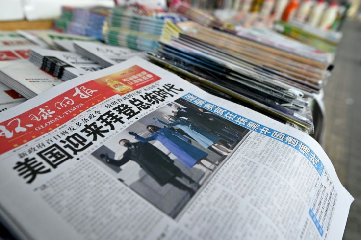 The front page of a Chinese newspaper showing the inauguration of US President Joe Biden. Beijing has called for a reboot of relations with Washington