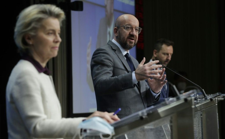 EU leaders Ursula von der Leyen (L) and Charles Michel (C) said the bloc wanted to a repeat of the height of the first wave, in March last year, when several members panicked and closed off national borders unilaterally, triggering travel chaos