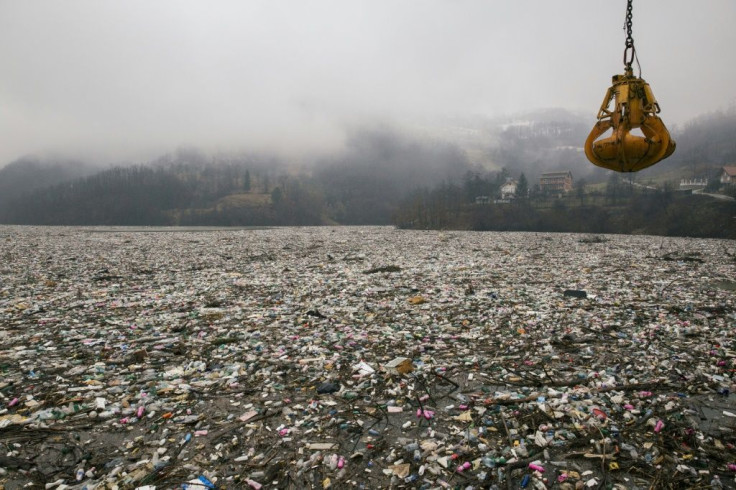 Clearing up the clumps of garbage has become a regular activity for dam operators